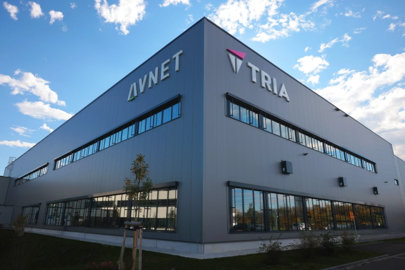 Exterior of a Tria building with company signage